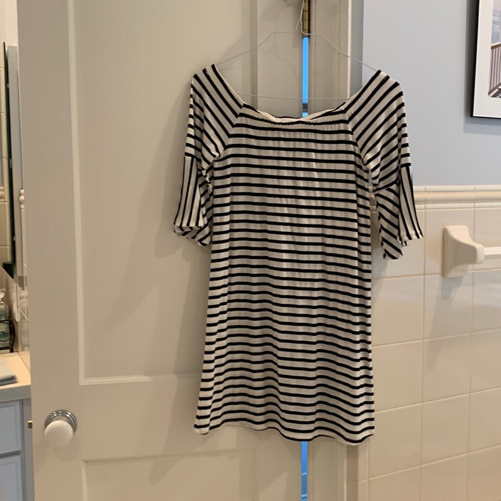 Stripped mini dress can be worn on or off the shoulder